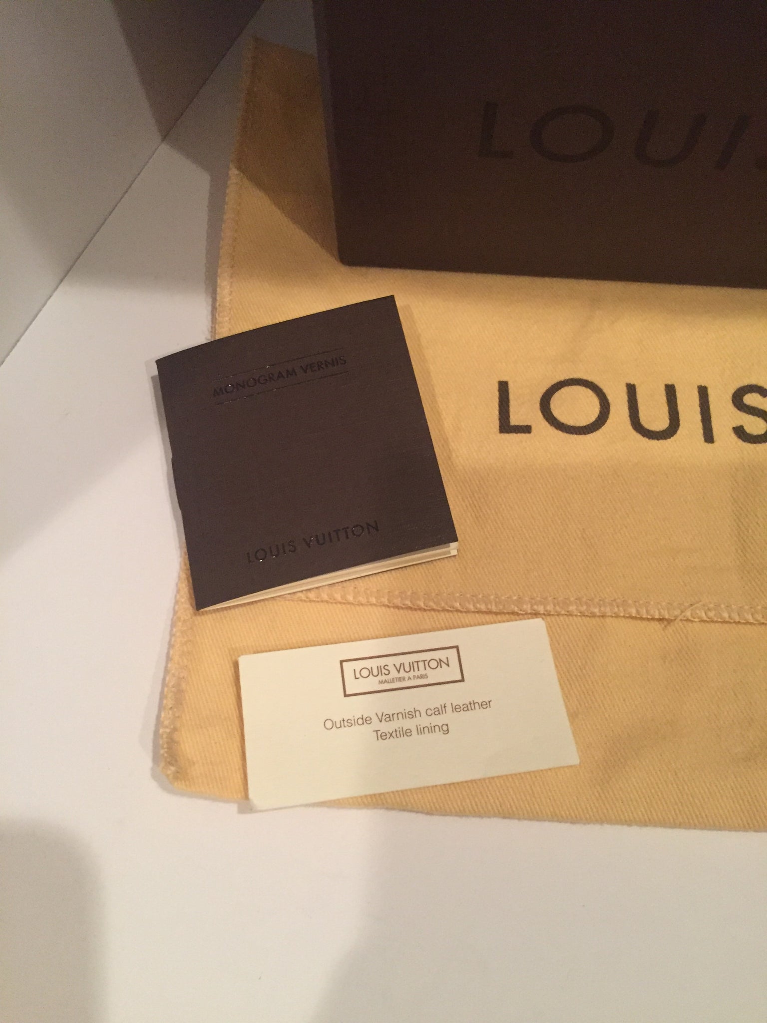 Louis Vuitton Small Box and dust bag.